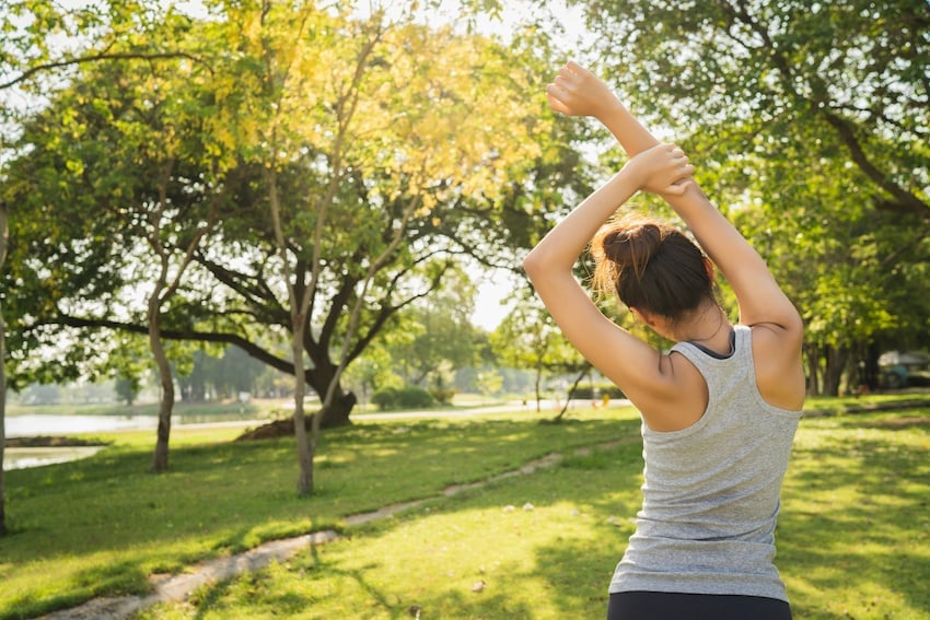 Healthy-young-asian-runner-woman-warm-up-the-body-stretching-before-exercise-and-yoga.jpg
