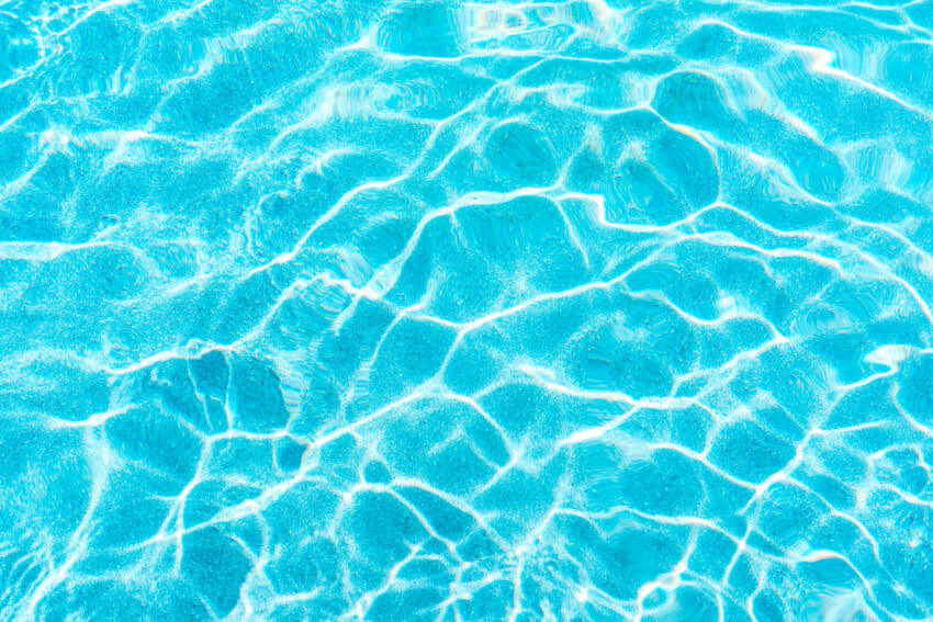 Abstract-pool-water-surface-and-background-with-sun-light-reflection.jpg