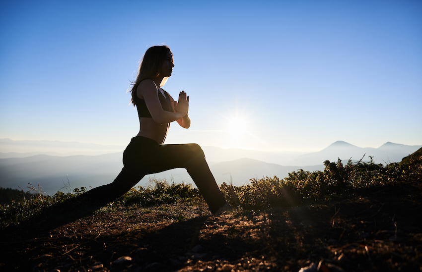 Young-woman-practicing-yoga-in-the-morning-in-mountains.jpg