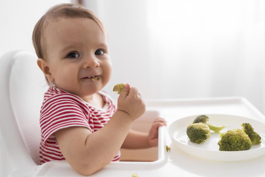 Adorable-baby-playing-with-food.jpg