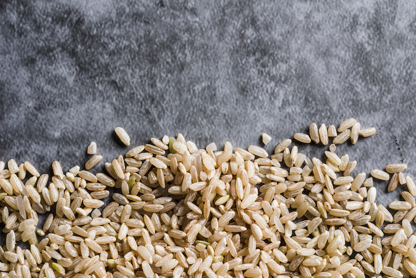 Scattered-brown-rice-on-table.jpg