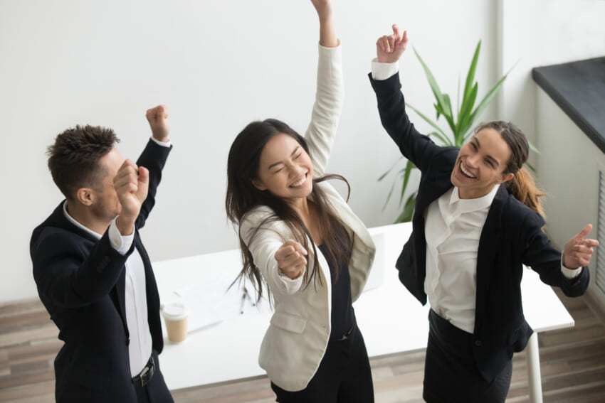 Victory-dance-concept-excited-diverse-coworkers-celebrating-business-success.jpg