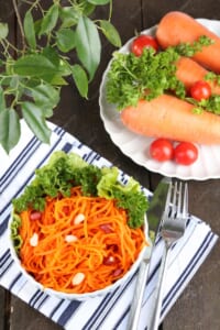 Carrot-salad-plate-napkin-wooden-table_392895-255232.jpeg